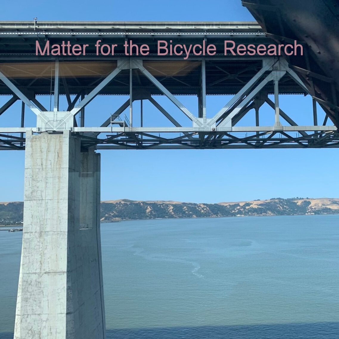 Album cover for Matter for the Bicycle Research. Underside of a bridge over a body of water.