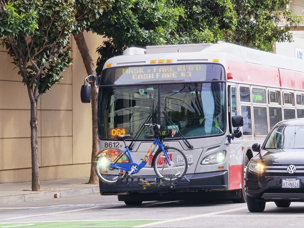 A Muni bus with a bike on the front. Photo by Parker Day.