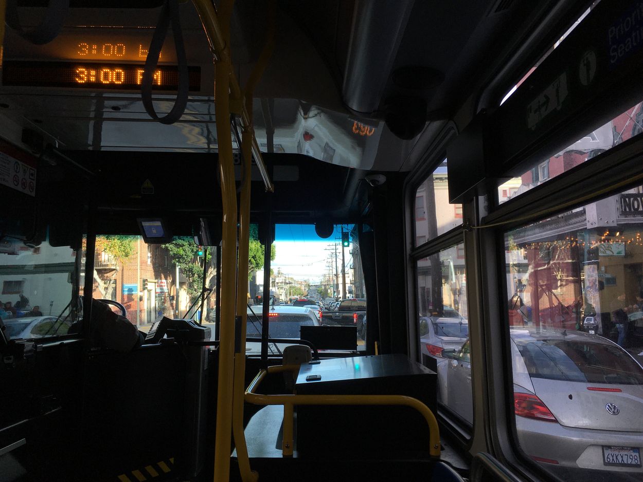 A bus sits in traffic on eastbound 16th Street. To preserve parking, bus lanes are only planned for the westbound direction here.