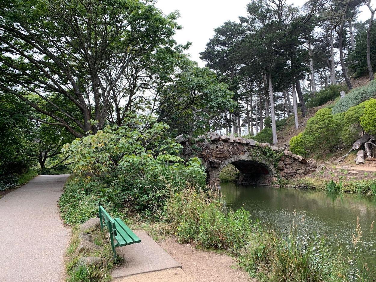 A stone bridge leads to the island in the middle of Stow
Lake.